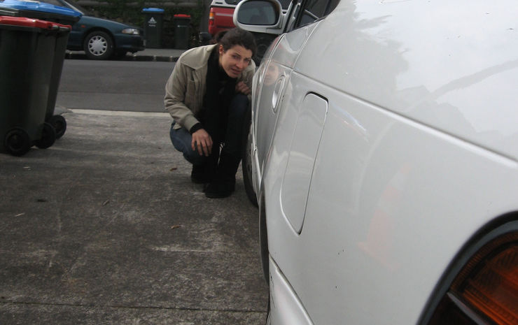 jessie-looking-down-the-side-of-car-large